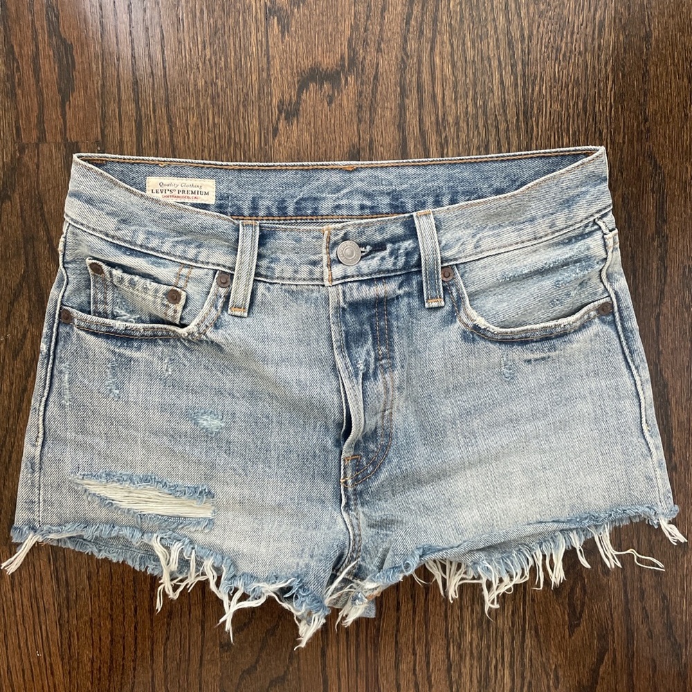 Levi’s light washed distressed denim shorts